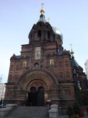 Saint Sophia Cathedral in Harbin with people walking in front