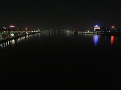 Ahmedabad riverfront with modern skyline and clear blue sky