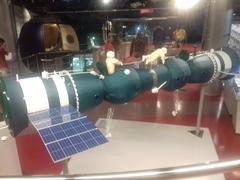 Model of Soyuz 4 and 5 docked with cosmonauts spacewalking for transfer