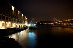 Park Island Ferry Pier at night with Tsing Ma Bridge on the right in Ma Wan, Hong Kong