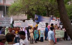 Protesters with banners and placards supporting the President of Pakistan at Hyderabad Press Club