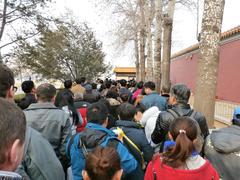 crowd waiting in line at the entrance to Tiananmen Square in Beijing