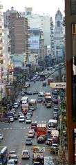 Avenida Rivadavia street in Buenos Aires with busy traffic and historic buildings