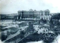 1901 construction of Almudena Cathedral with Royal Palace in the background