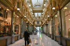 Brussel passage with shops and people walking