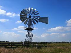 Windmill against a beautiful blue sky in De Alde Feanen National Park