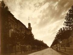 Torino's Corso Francia facing west at Via Palmieri junction with Palazzo della Vittoria on the left