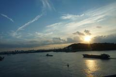 Dong River downstream near Pearl River, viewed from S3 Guangzhou-Shenzhen Riverside Expressway, with Guangzhou Economic and Technological Development Zone skyline in the background