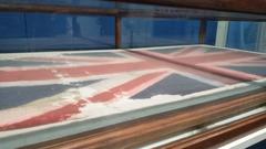 British flag stained with blood