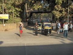 IIT Bombay entrance with the institute's iconic archway and lush greenery