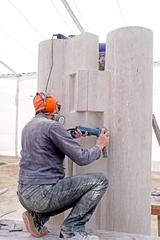 Sculptor creating a piece of art in Parque de las Esculturas during the 6th International Symposium of Sculpture Group