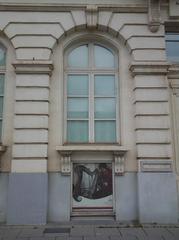 Archway and lowered window on the ground floor of Hôtel de Spangen