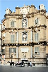 Quattro Canti in Palermo with summer statue and fountain