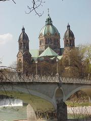 St. Lukas Church in Munich with Kabelsteg Bridge in the foreground