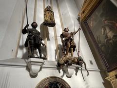 Polychrome wooden statues in the left aisle nave