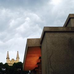 Frank Lloyd Wright's Unity Temple with First United Church of Oak Park steeple in the background