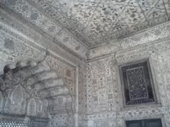 porch of an ancient Indian building in front of a stone staircase