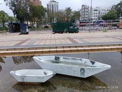 Paper boat art installation in water pool, Sai Kung Town, Hong Kong