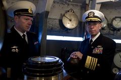 U.S. Navy Adm. Mike Mullen tours the Russian protected cruiser Aurora in St. Petersburg, Russia