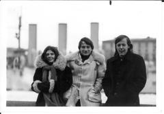 Person with long hair standing along the Neva River in Leningrad, December 1974