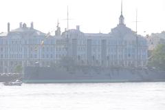 Aurora, the famous Russian cruiser, docked in St. Petersburg with clear blue skies in the background