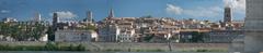 Panoramic view of Arles from the north east corner of Trinquetaille with ruins of the Lion bridge