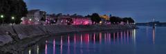 Musée Reattu illuminated in magenta light during Rencontres internationales de la Photographie 2008