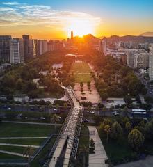 Aerial view of Parque Araucano with lush green areas, walkways, and recreational facilities