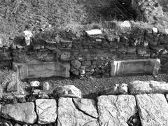 Spolia bases in reuse in the front wall lining the street south of the ancient agora in Thessaloniki