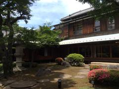 traditional Japanese house with wooden architecture and garden