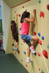 Child rock climbing at Glazer Children's Museum