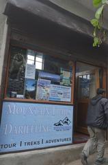 Scenic view of Darjeeling with lush green tea gardens and mountains