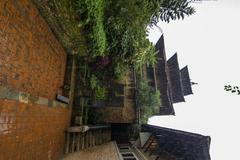 courtyard of the Patan Durbar Square with ancient temples and sculptures