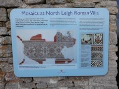 North Leigh Roman Villa ruins with trees in the background