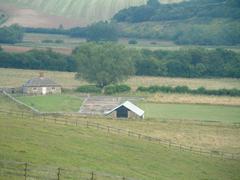 North Leigh Roman Villa ruins in a grassy field