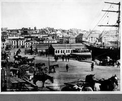 Historical view of Circular Quay, Sydney, with the ship Cutty Sark loading wool, 1883-1894