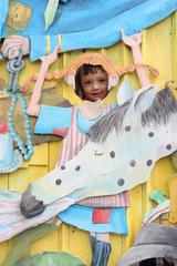 little girl dressed as Pippi Longstocking posing