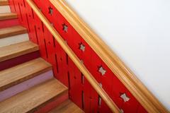 staircase with low handrail for children