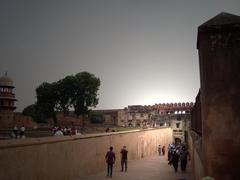 Agra Fort photographed from a distance showing its grand red sandstone architecture