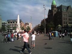 Dam Square with Royal Palace and Nieuwe Kerk in Amsterdam