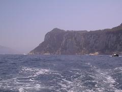 Capri Island view with cliffs and Mediterranean Sea