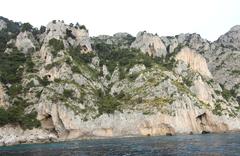 Capri island view with rocky cliffs and blue sea, 2017