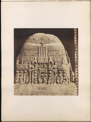 Drum slab carved with a stupa attended by several figures including naga females and naga kings worshipping Buddha's relics