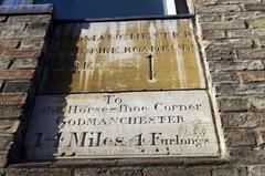 End of Godmanchester Turnpike plaque on Kettle's Yard wall