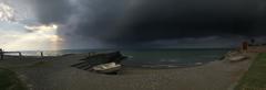 sudden dark clouds appearing on a previously clear day