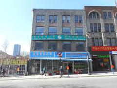 Boulevard Saint-Laurent scene with Kien Vinh Corp building