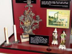 Interior view of Arabia Steamboat Museum showcasing artifacts with visitors walking around