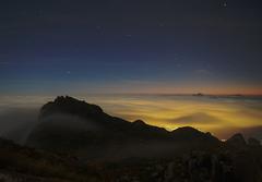 sunrise in Serra dos Órgãos National Park with distant Three Peaks