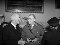 British Generals during World War II, General Sir Hastings Ismay, 1st Baron of Wormington, talking to Sir John Simon at a farewell dinner for Admiral Stark at the Royal Naval College, Greenwich