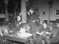 Jack Boulton with senior officers in the wardroom of the Royal Naval College, Greenwich